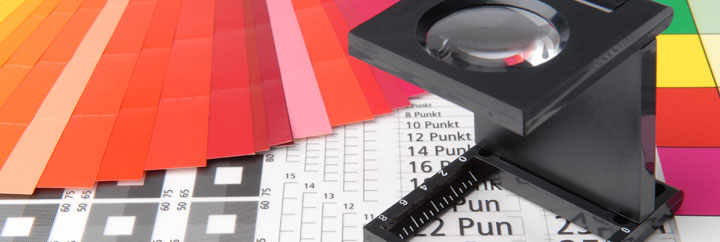 Color swatches and ruler on table - tools for precise color matching and measurement.